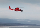 Coast Guard on one of their daily patrols buzz us on Salal Hill.